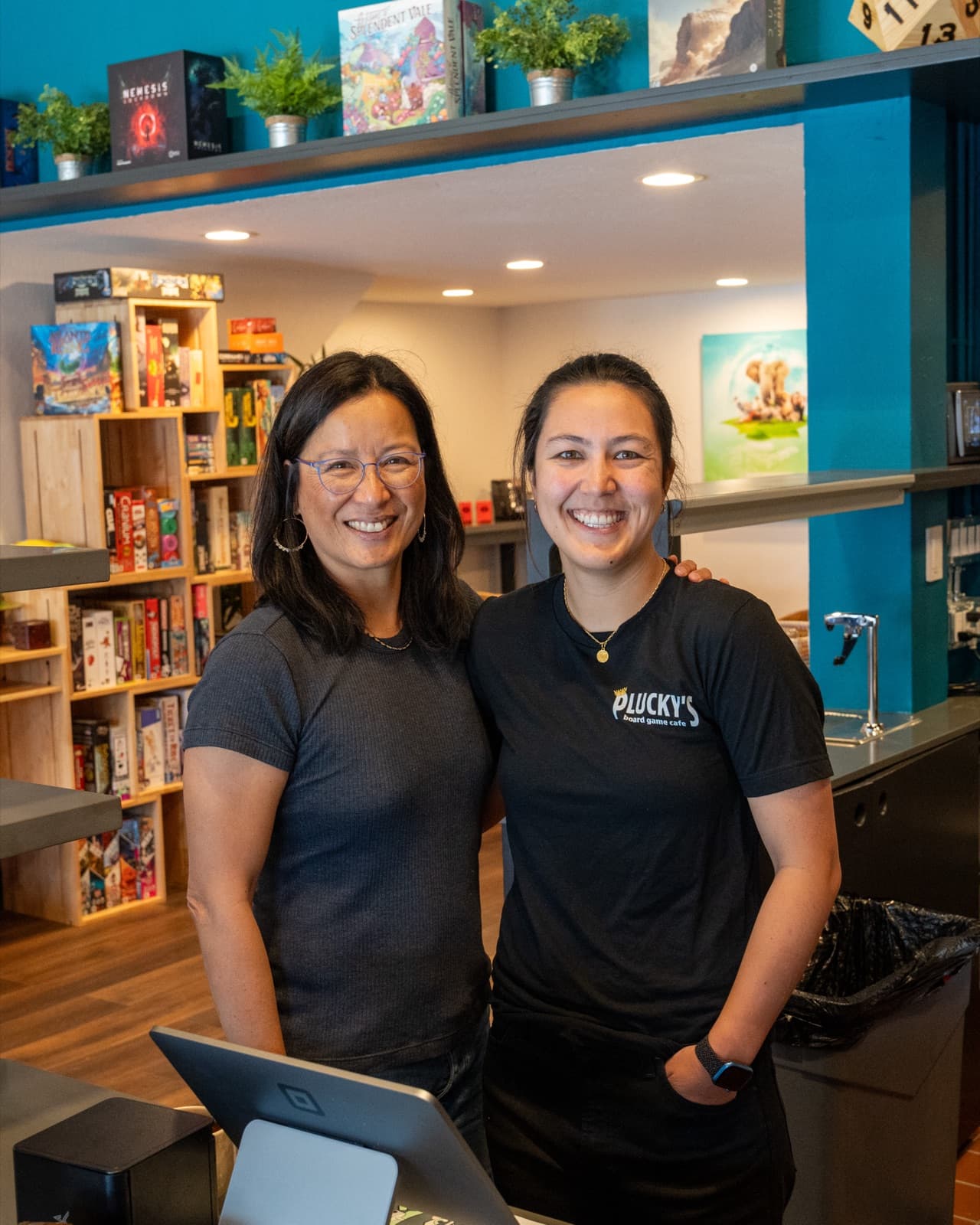 Mother and daughter owners behind the counter